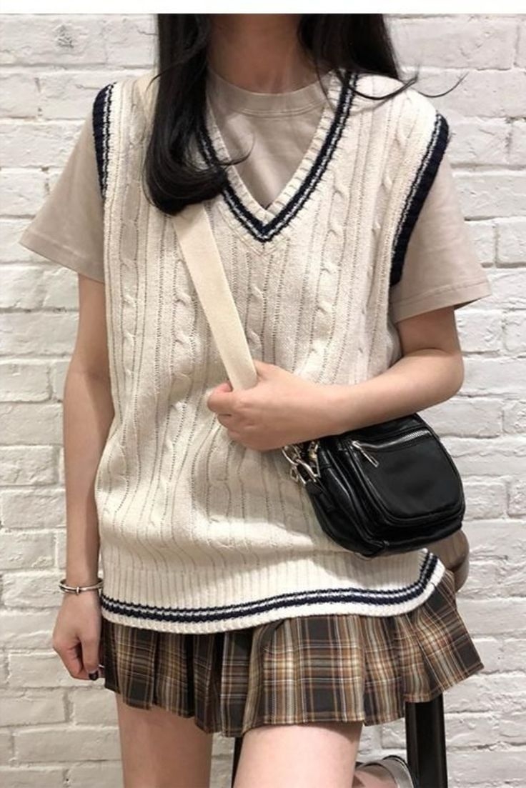 Свитер без рукавов