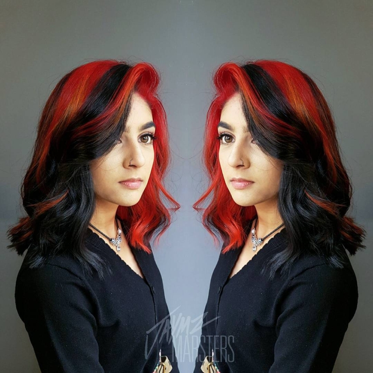 Рыжие волосы с черными прядями