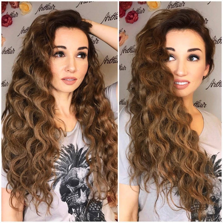 Нарощенные кудрявые волосы