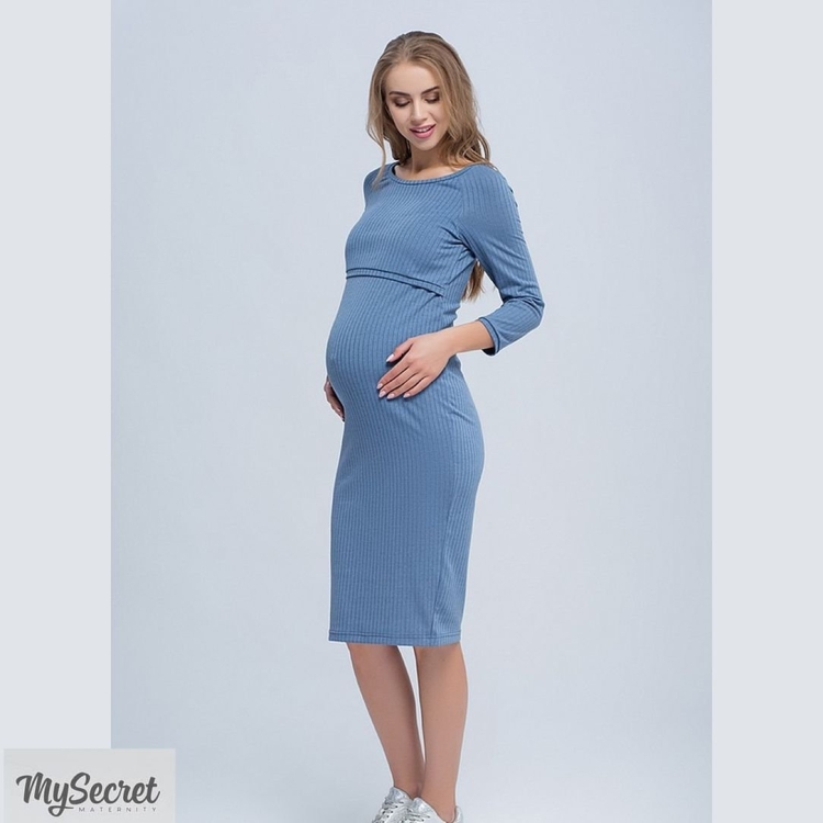 Беременная в черном платье