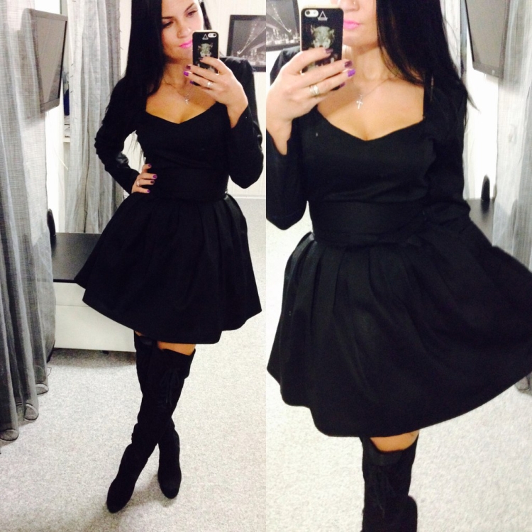 Черное платье с декольте и пышной юбкой