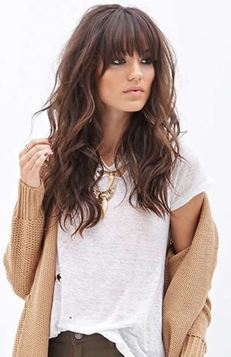 Стрижка на длинные волосы с челкой шторкой