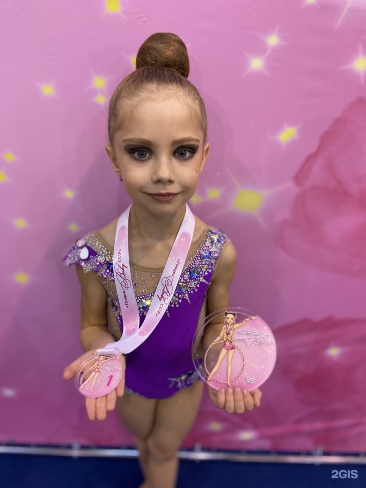 Прическа гимнасток по художественной гимнастике