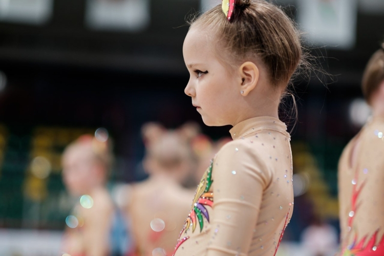 Прическа гимнастки для выступления