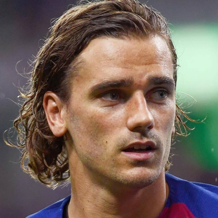 Антуан Гризманн с длинными волосами