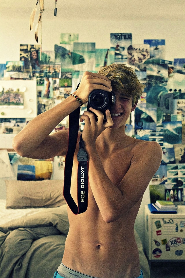 Парень с фотоаппаратом