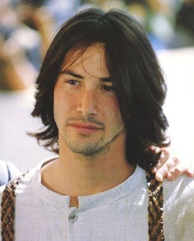 Киану Ривз с длинными волосами в молодости